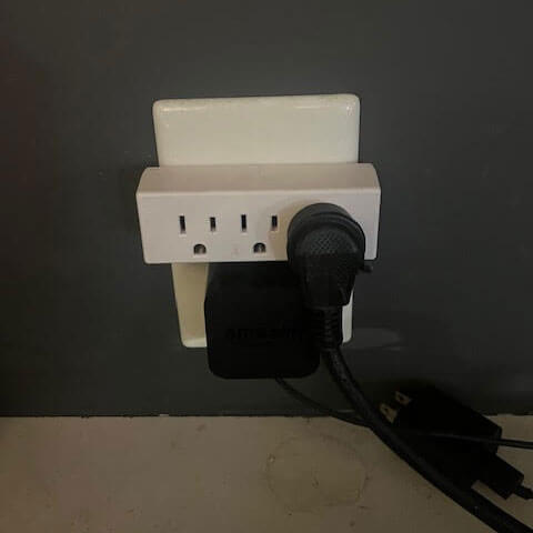 A multiplug in an outlet.